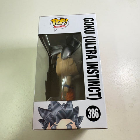 Goku Ultra Instinct - Dragon Ball Z Funko Pop 386 Vinyl Figure (11.4 Cm L × 8.9 Cm W × 15.9 Cm H)