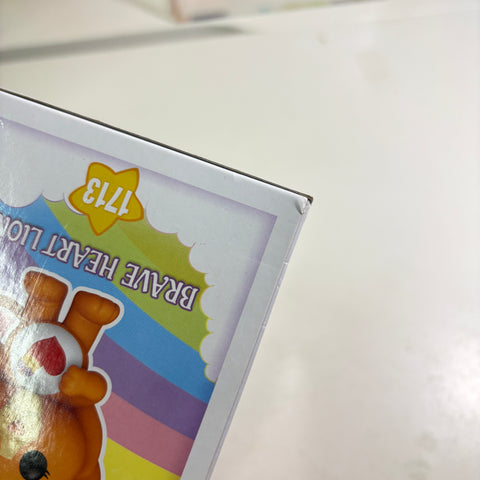 BOX FLAWS VIEW PHOTOS Brave Heart Lion - Care Bears Funko Pop 1713 Vinyl Figure (11.4 Cm L × 8.9 Cm W × 15.9 Cm H)